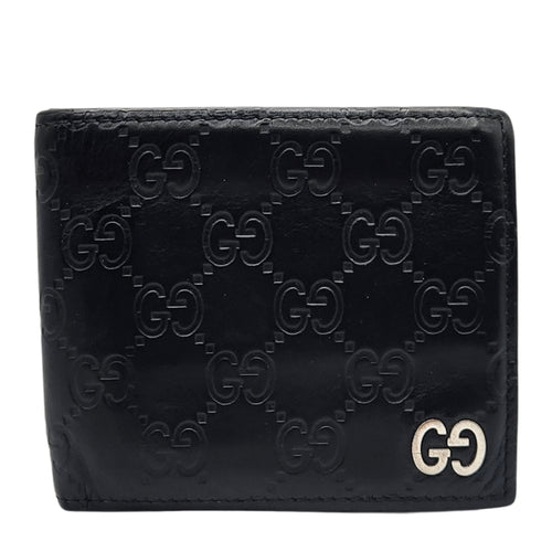 GG Embossed Monogram Leather Wallet
