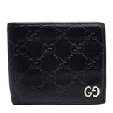 GG Embossed Monogram Leather Wallet