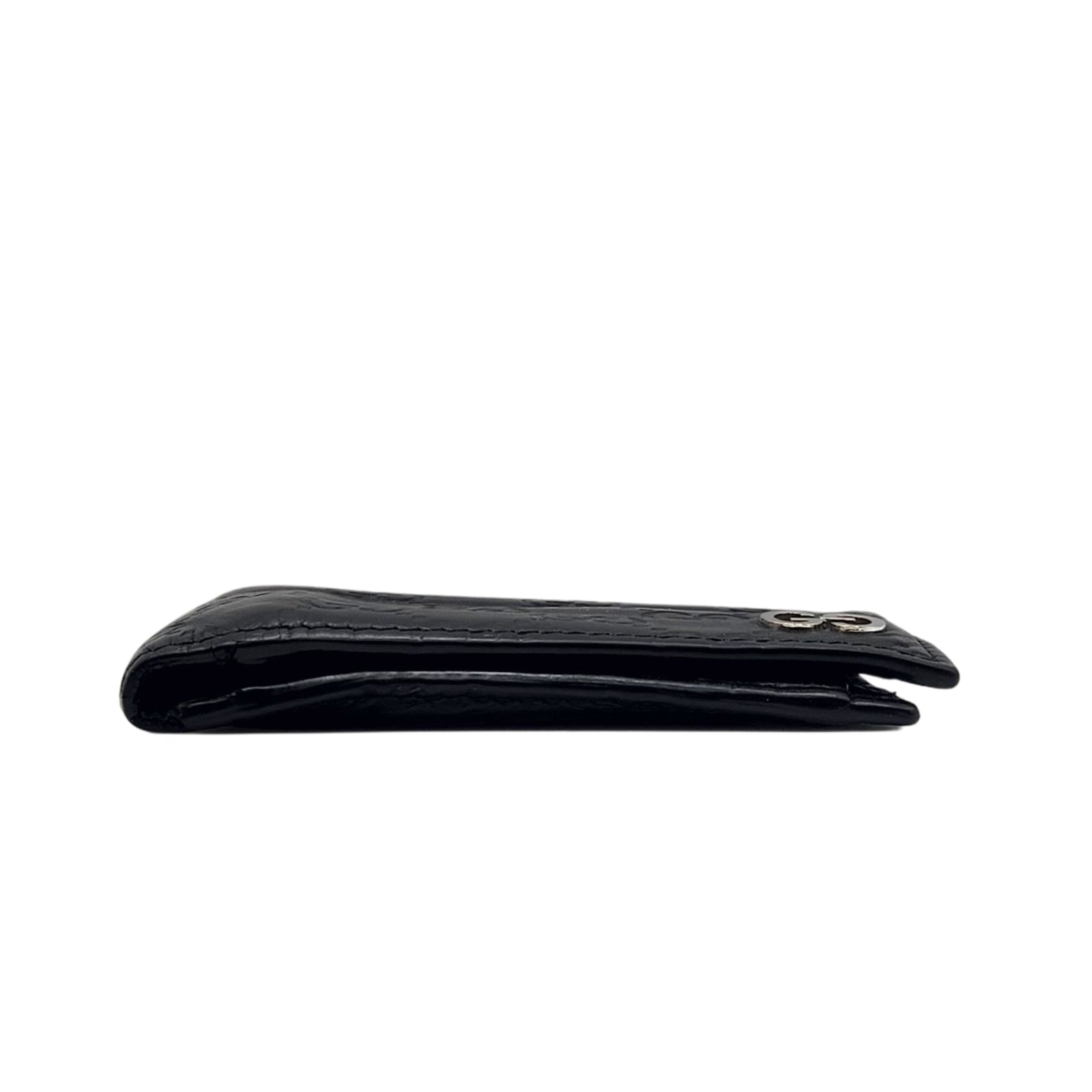 GG Embossed Monogram Leather Wallet