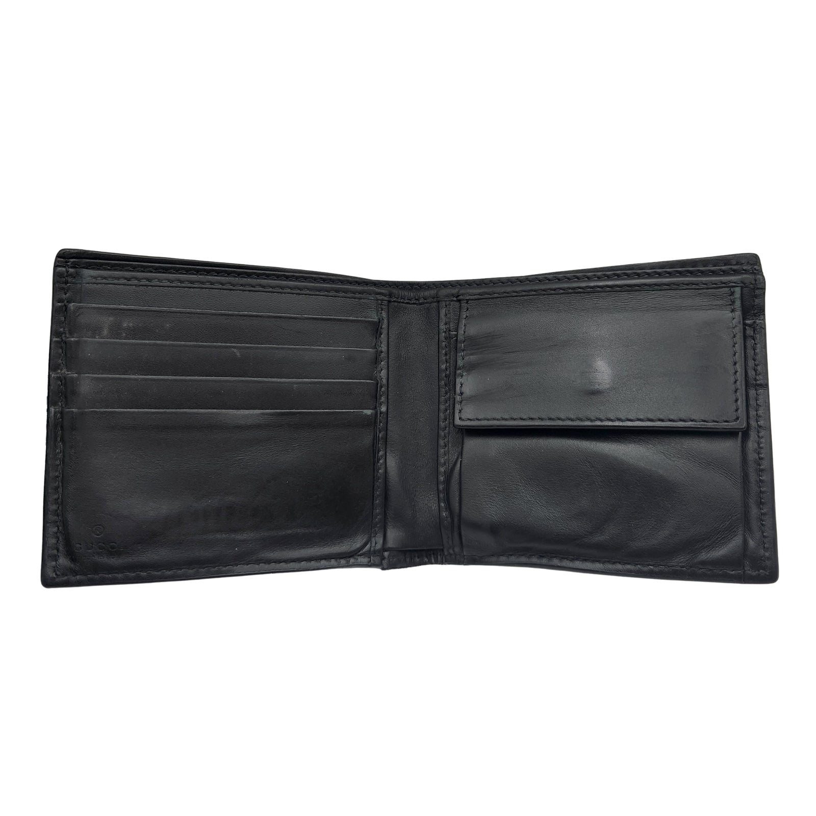 GG Embossed Monogram Leather Wallet