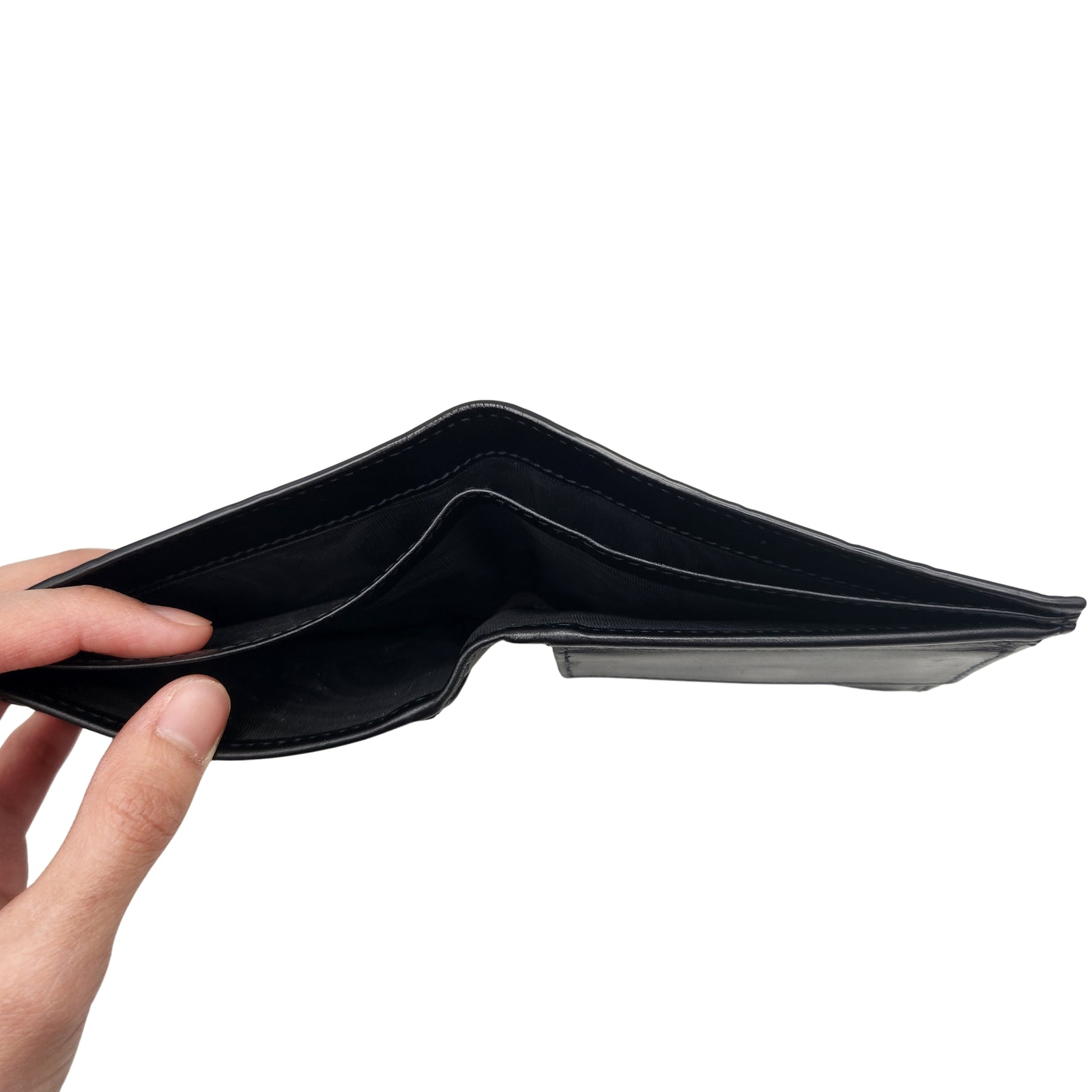 GG Embossed Monogram Leather Wallet