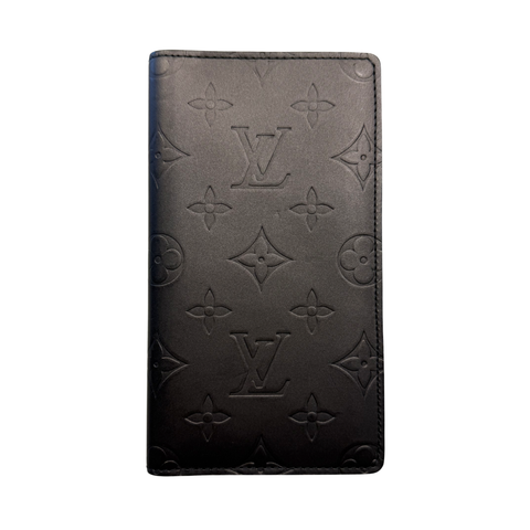 GG Embossed Monogram Leather Wallet