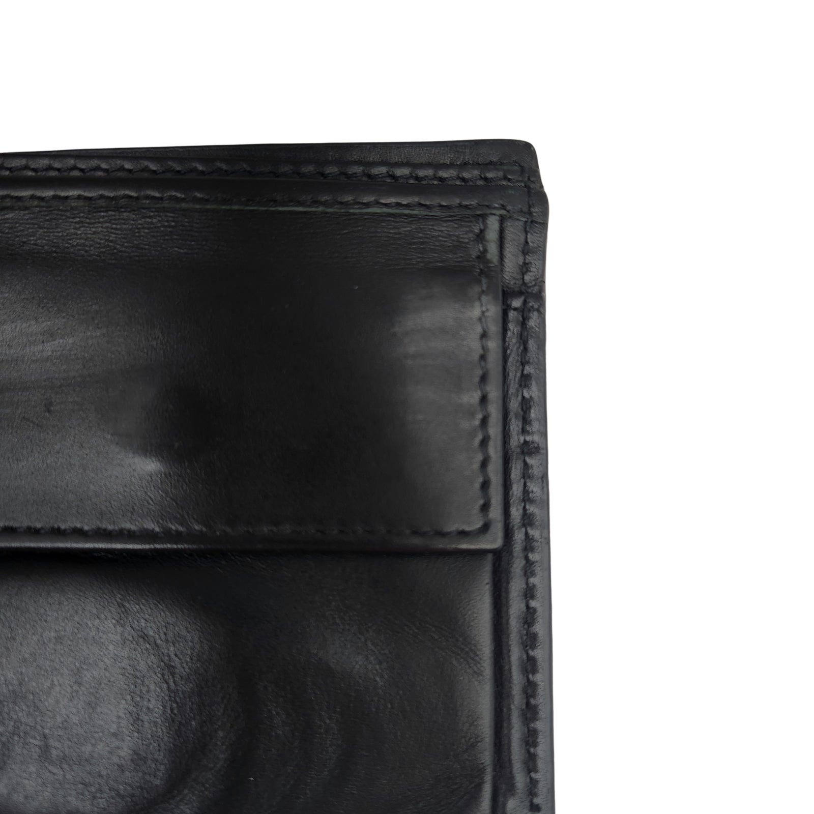 GG Embossed Monogram Leather Wallet