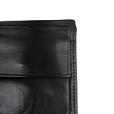 GG Embossed Monogram Leather Wallet