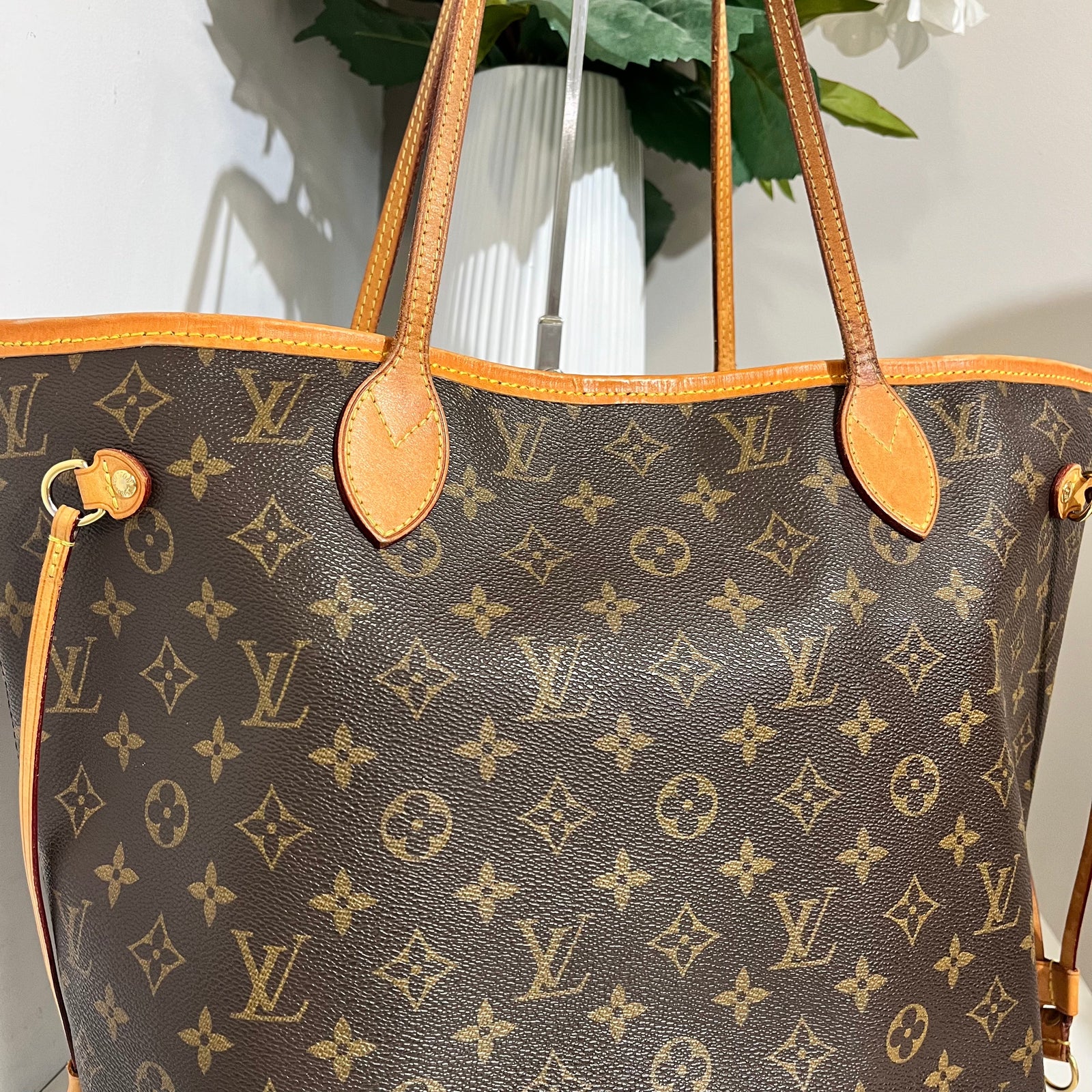 How can I clean this vachetta trim on my neverfull bag without