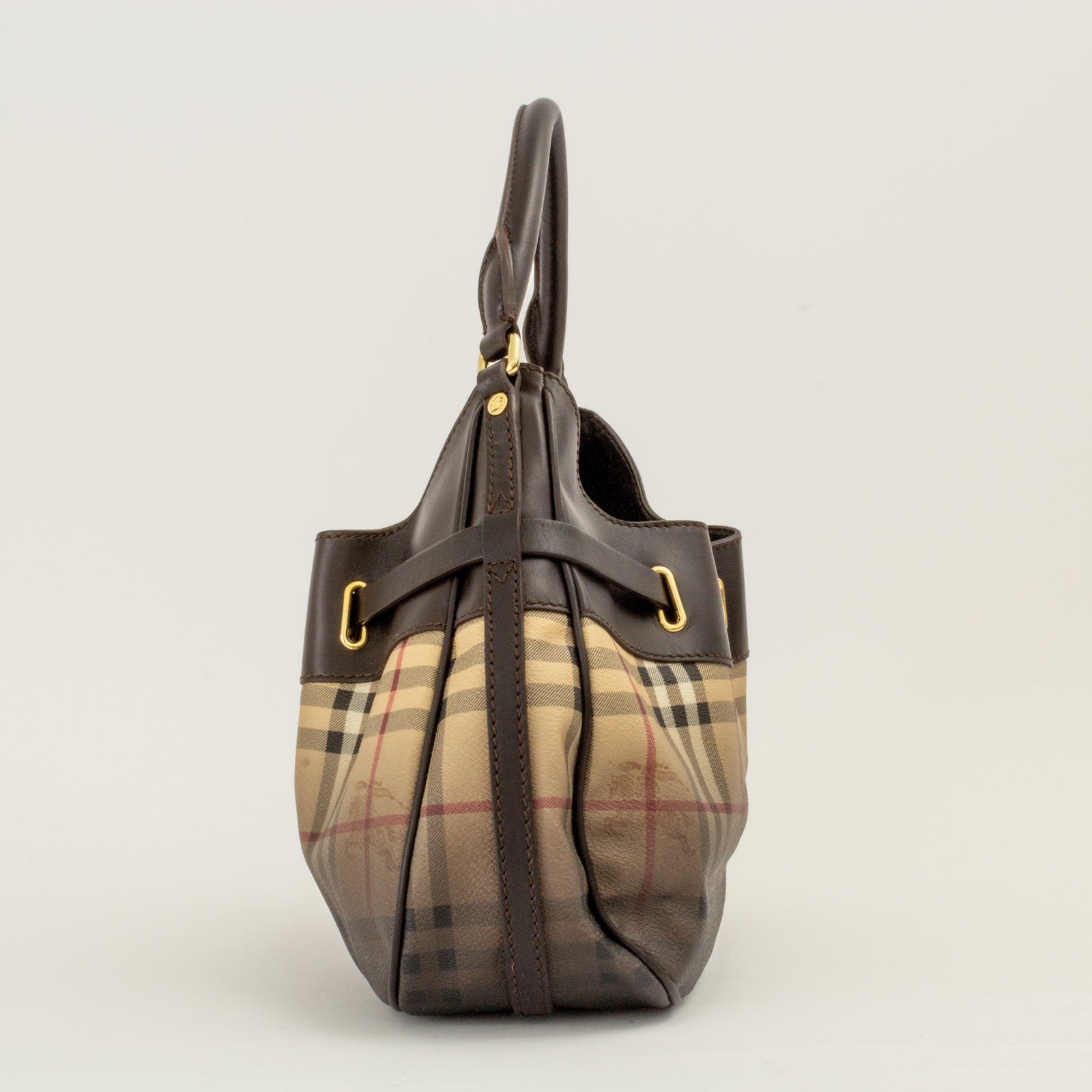 This chic hobo is crafted of classic Burberry Nova check canvas.