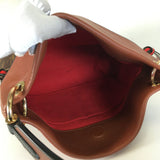 Monogram Tuileries Besace Caramel Rouge