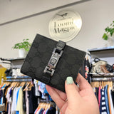 Monogram Piston Lock Compact Wallet